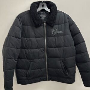 Ladies zipped woven jacket with Harley embroidered on the chest size large